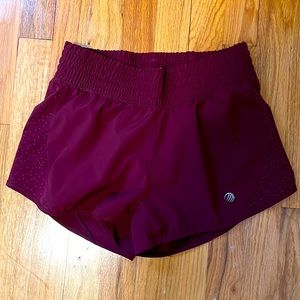 Pair of MPG maroon shorts- size small